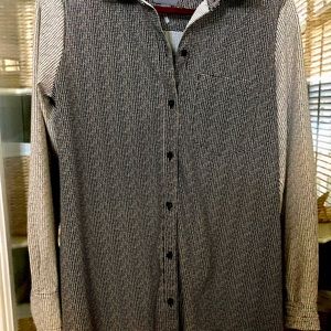 Upscale buttoned shirt.